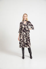Printed viscose dress with long sleeves and crossover neckline