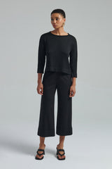 Maglia con treccia sulla schiena