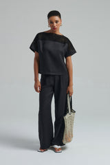 Blouse with knitted inserts